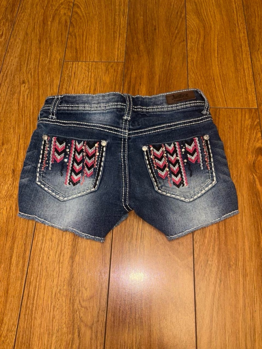 Y2K Justice navy blue denim shorts with pink and black chevron embroidery